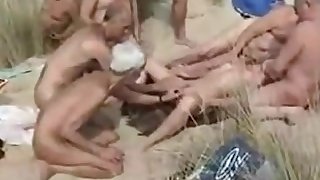 Blonde has sex with strangers on nude beach
